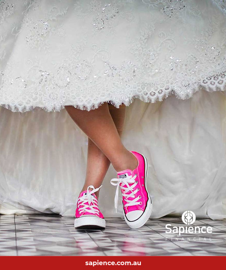 wearing pink sneakers under white wedding dress