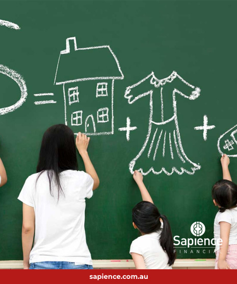 parents and children drawing on chalk board