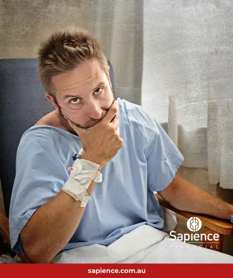 frustrated man in hospital gown looking at you